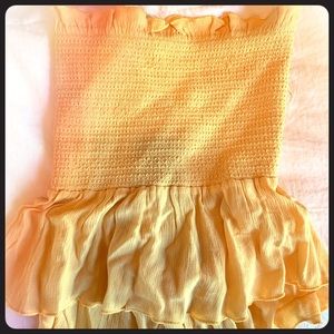 Yellow strapless top with tie back